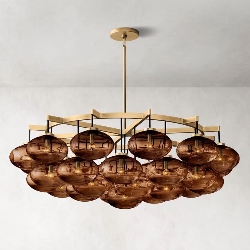 Modern Cabretti crystal globe chandelier illuminating a dining room table