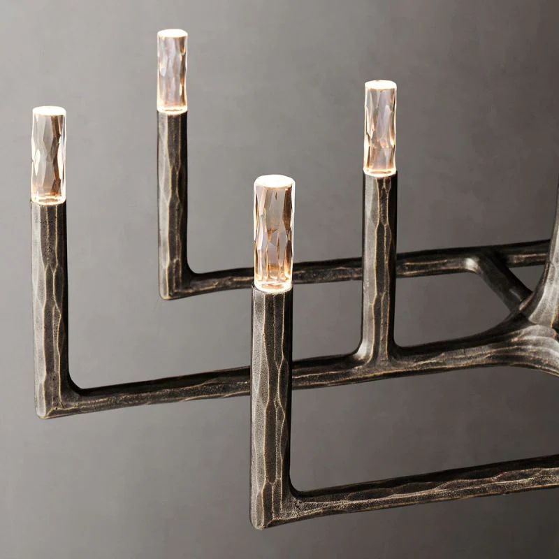 Close-up of matte black wrought iron frame on Radius rectangular chandelier