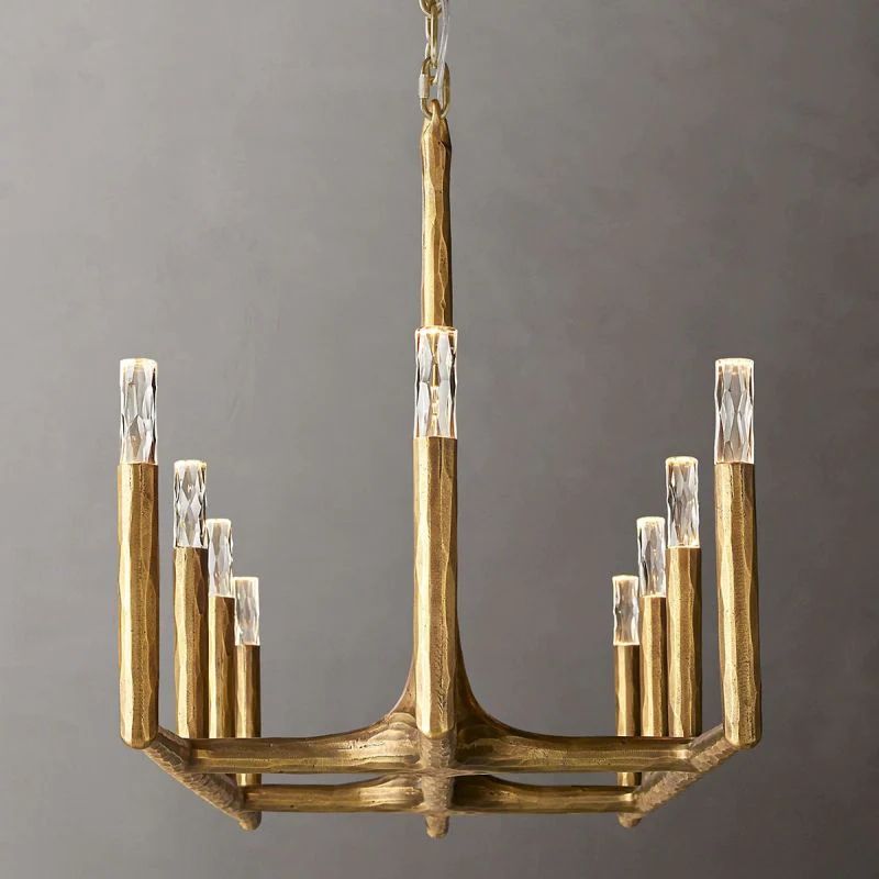 Close-up of matte brass wrought iron frame on Radius rectangular chandelier